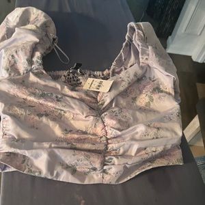 Lilac over the shoulder blouse from express, new with tag. Never worn